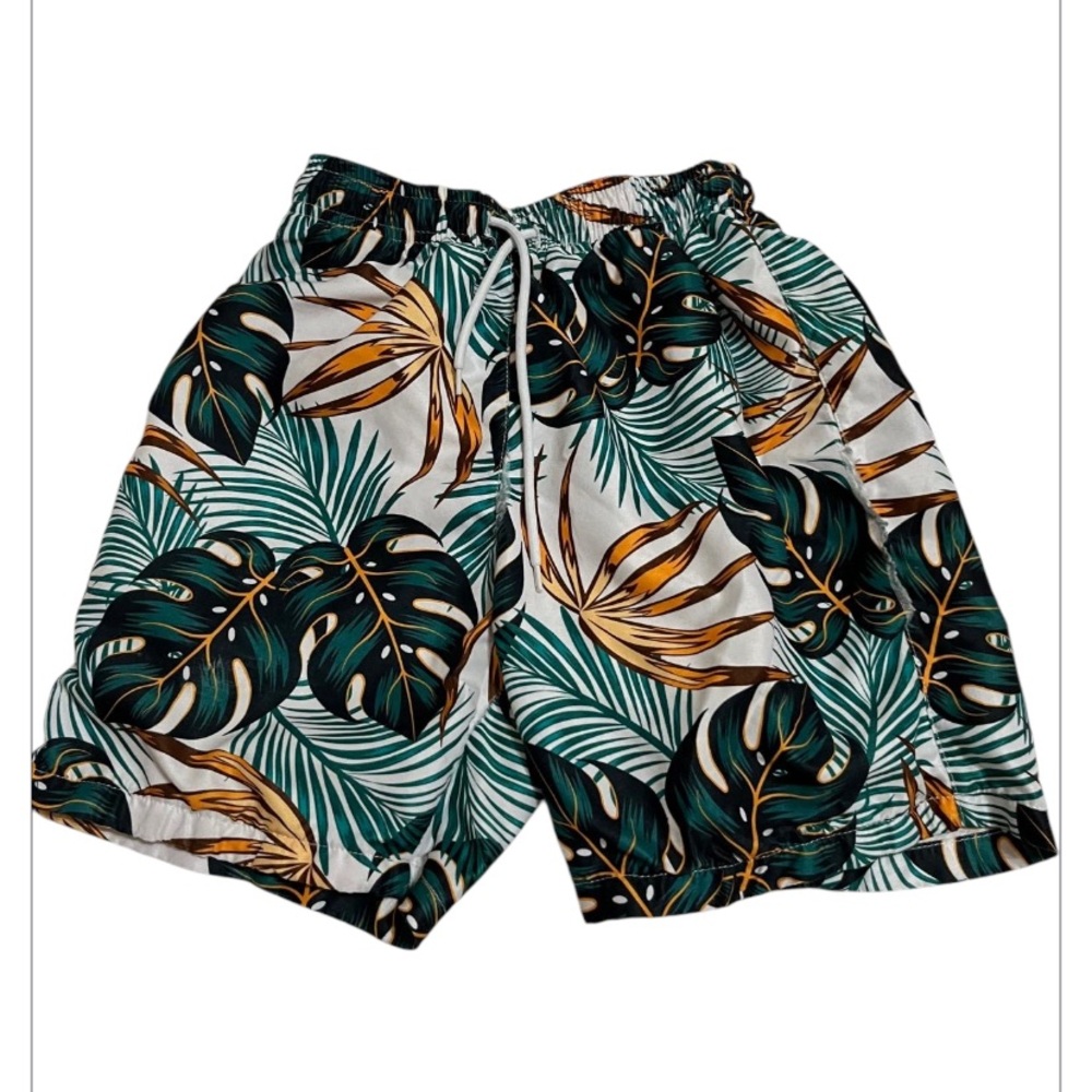 (8) Green and white tropical print swim trunks